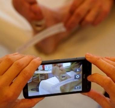 Telemedicinsk sårvurdering - fotografering